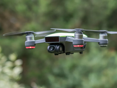 Drone hovers in the air
