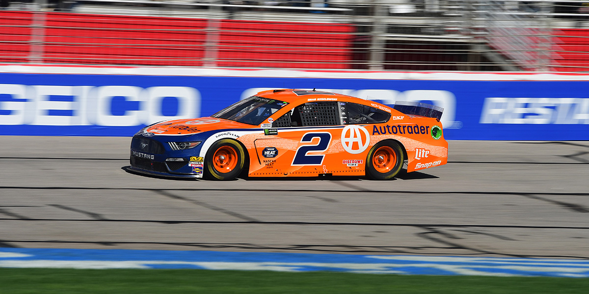 Orange No. 2 race car at track